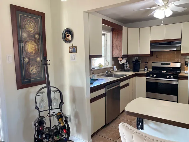 a room with a dresser and a wooden floor
