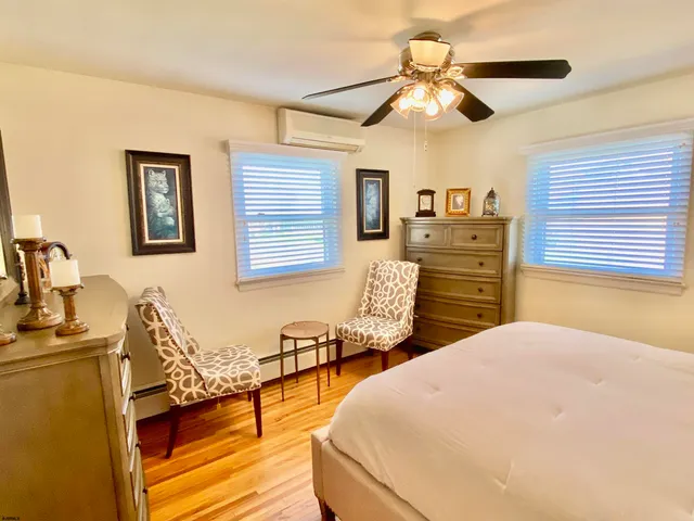 a view of a backyard with swimming pool