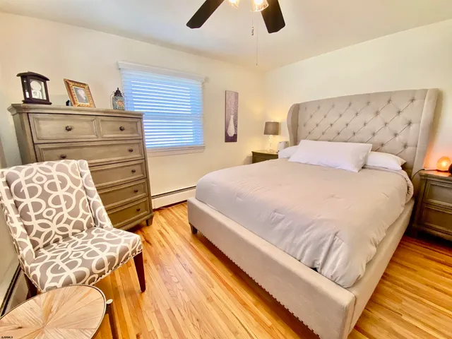 a group of people sitting on a street