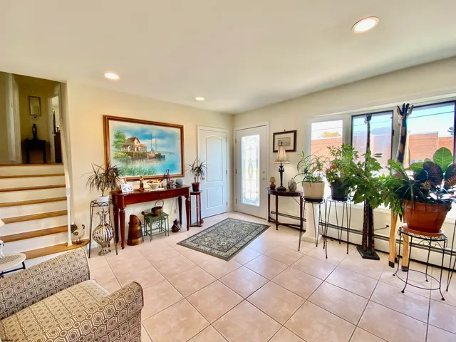 a kitchen with cabinets stainless steel appliances and a sink