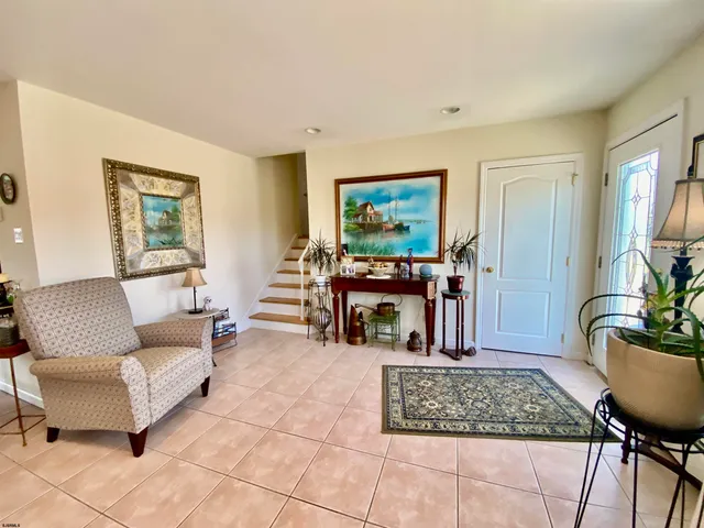 a kitchen with stainless steel appliances a sink stove and cabinets
