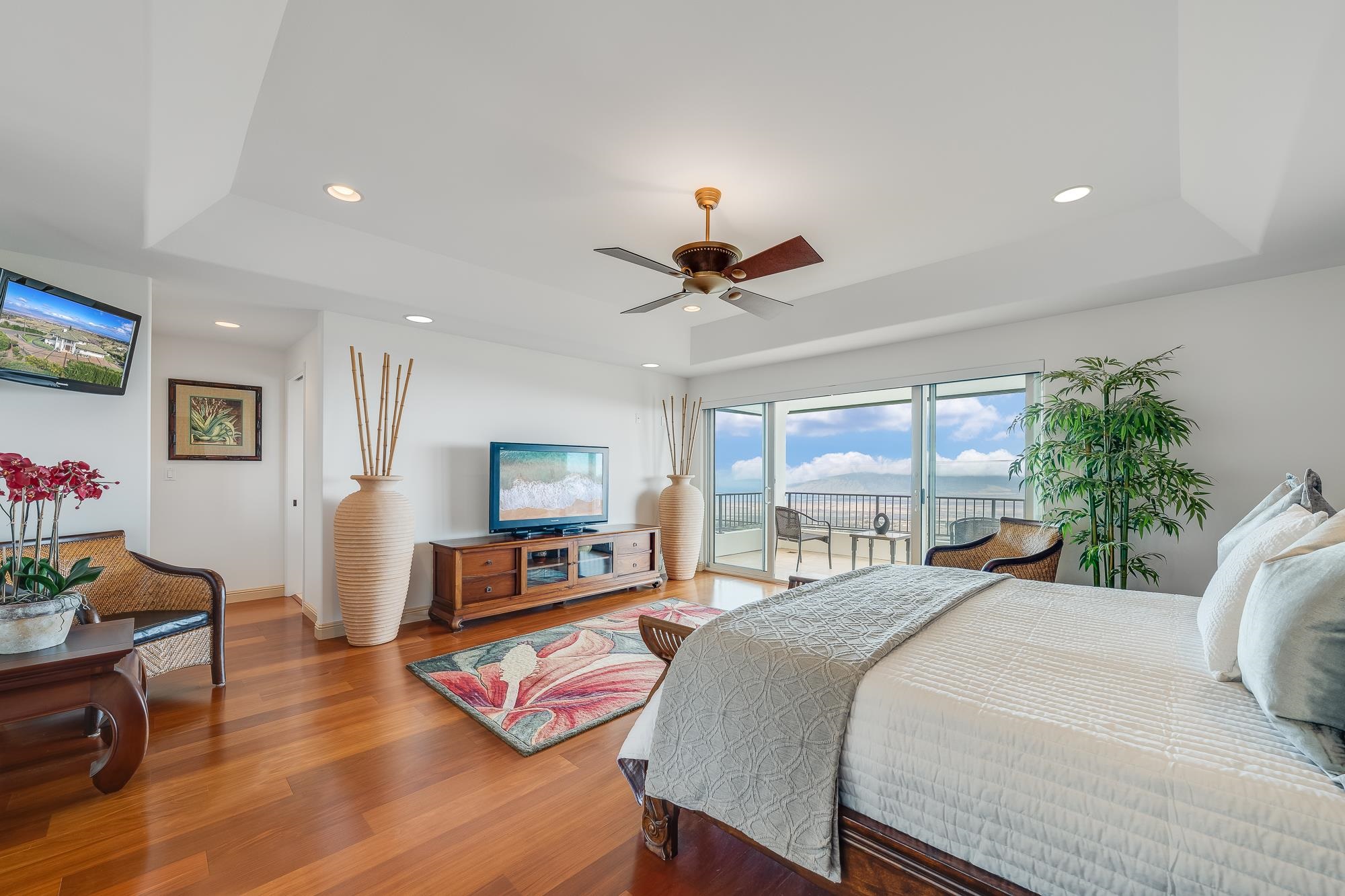 2705 Lower Kula Road Kula, HI 96790 - Photo 9 of 22 a bedroom with a bed and a large window