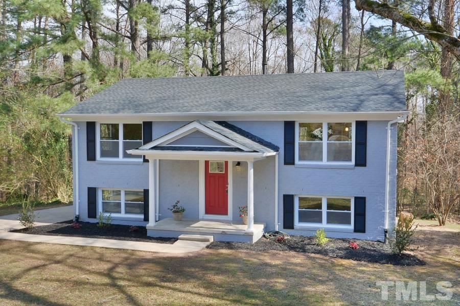 1717 Euclid Road Durham, NC 27713 - Photo 1 of 16 a front view of a house with a yard