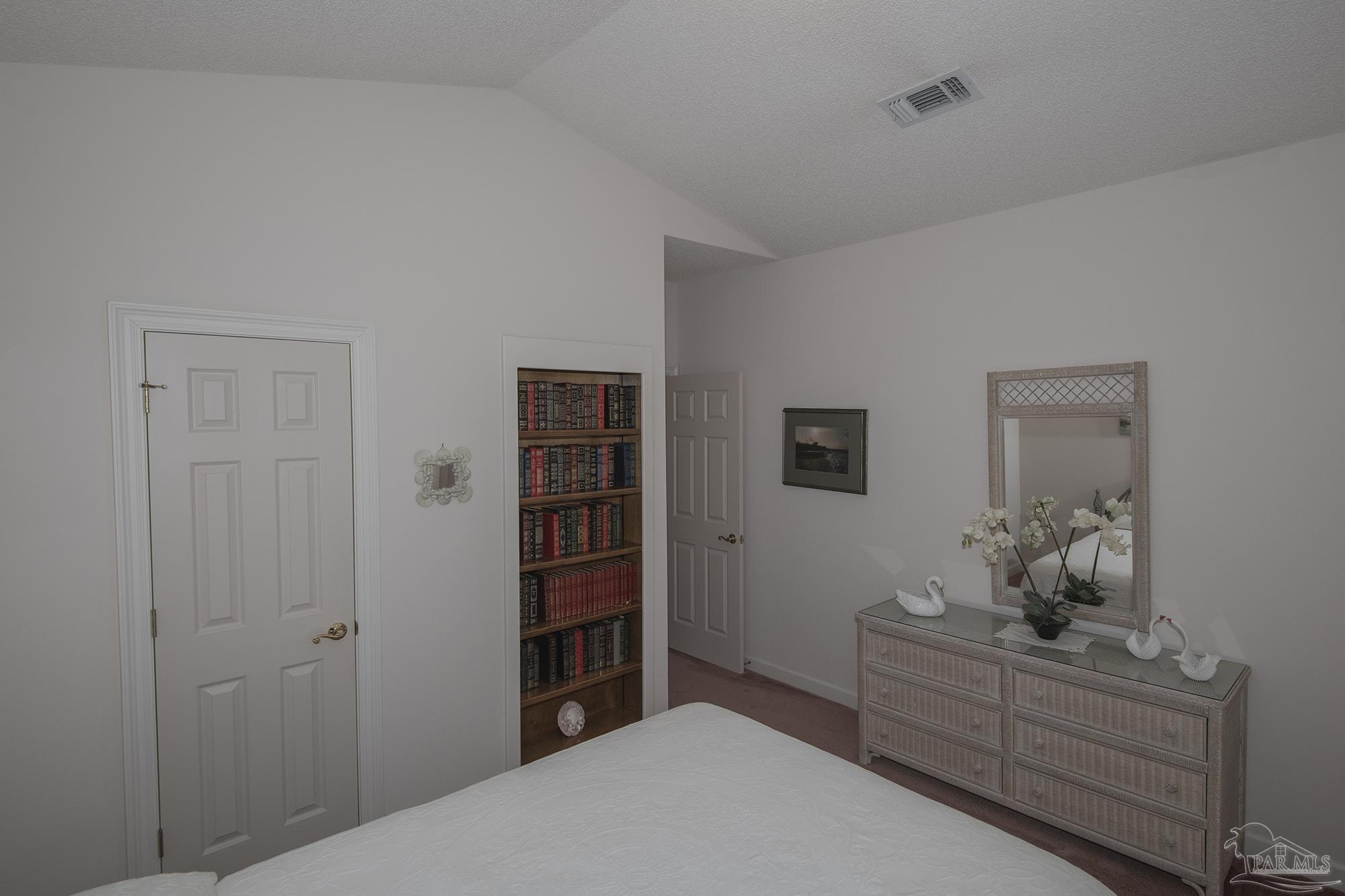 1505 Kings Road Cantonment, FL 32533 - Photo 42 of 57 a bedroom with a bed and closet
