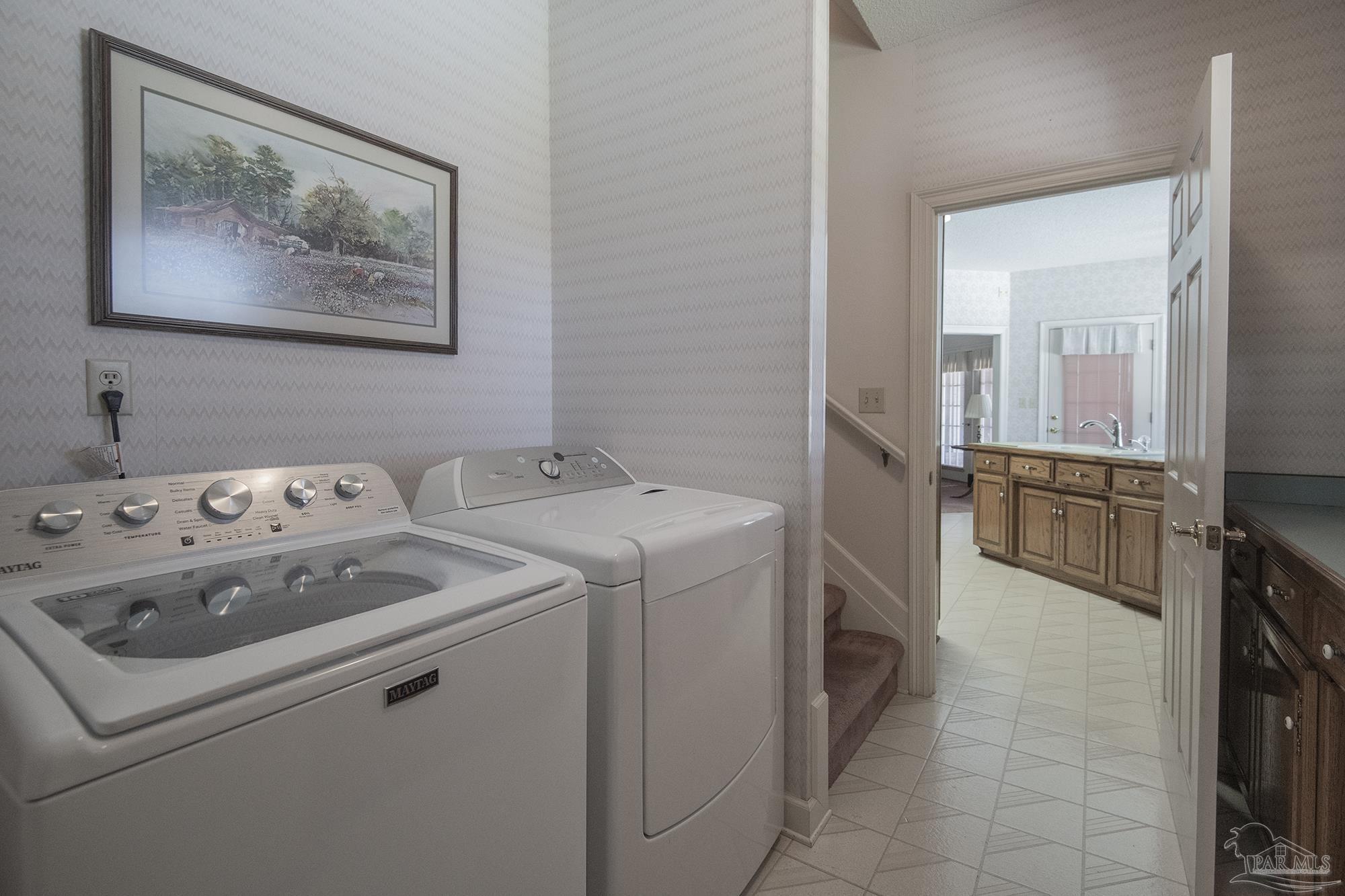 1505 Kings Road Cantonment, FL 32533 - Photo 49 of 57 a utility room with dryer and washer