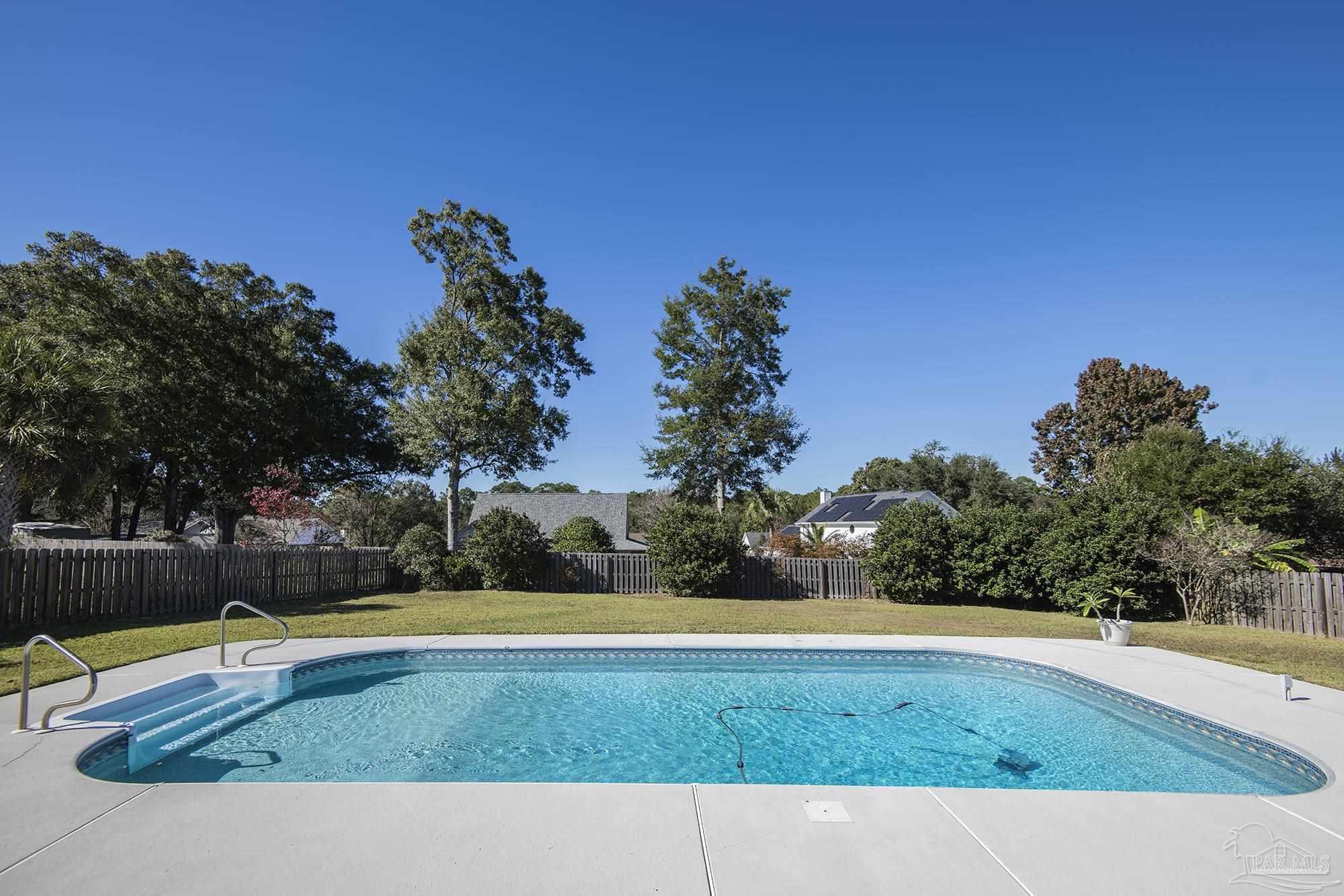 1505 Kings Road Cantonment, FL 32533 - Photo 55 of 57 a view of swimming pool with a yard