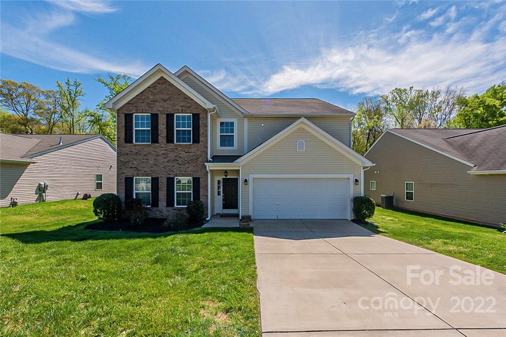 1629 Beleek Ridge Lane Clover, SC 29710 - Photo 1 of 23 a front view of a house with a yard and garage