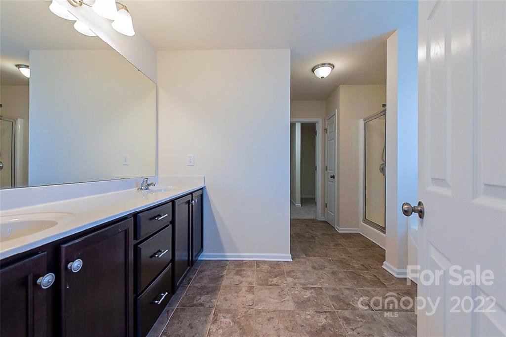 1629 Beleek Ridge Lane Clover, SC 29710 - Photo 18 of 23 a bathroom with a sink and a mirror