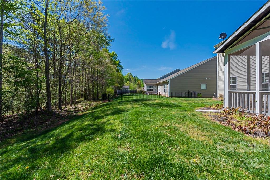 1629 Beleek Ridge Lane Clover, SC 29710 - Photo 22 of 23 a view of a house with backyard and porch