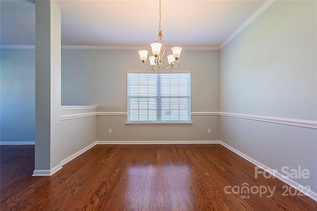 1629 Beleek Ridge Lane Clover, SC 29710 - Photo 5 of 23 a view of a room with wooden floor cabinets and a window