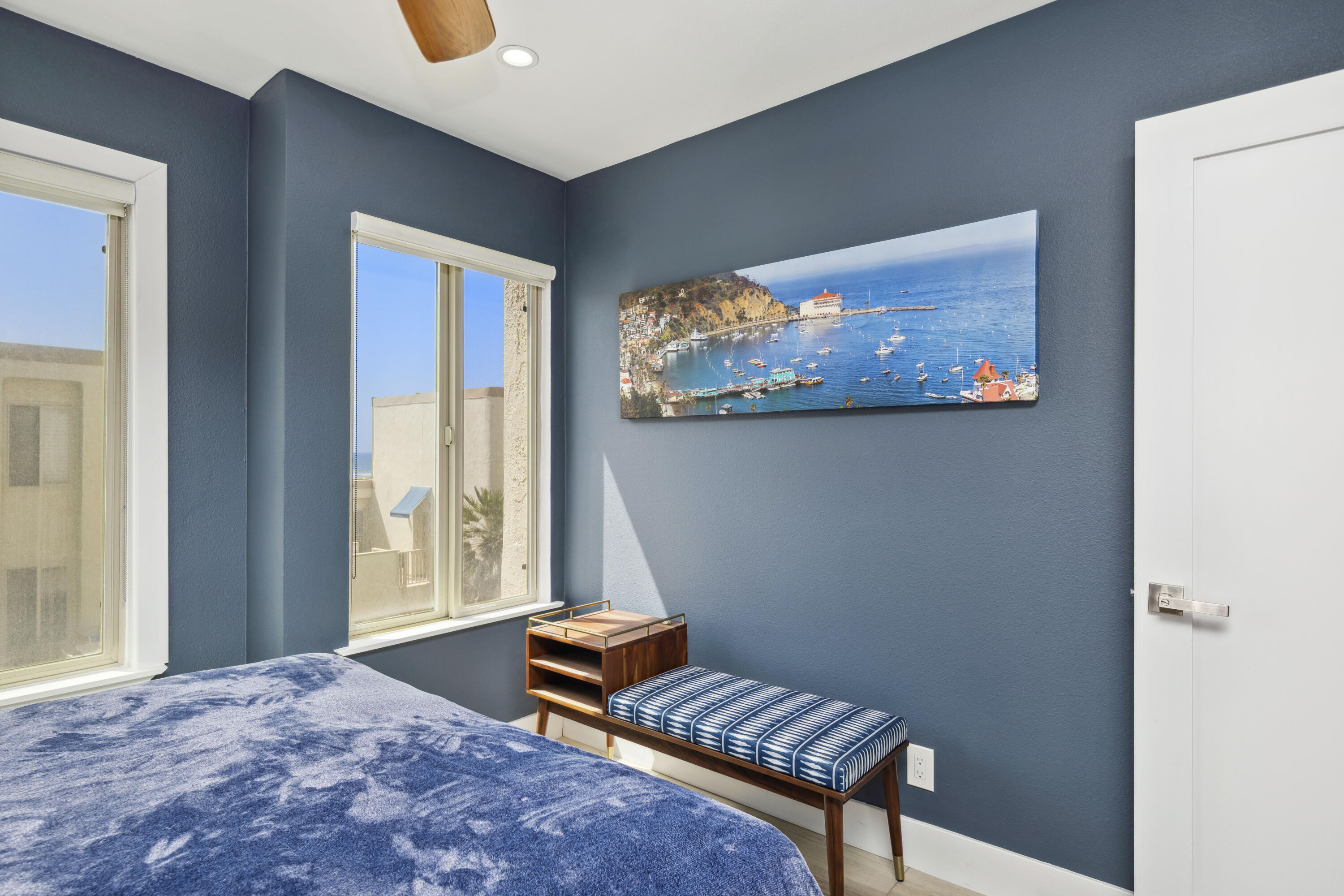 711 Pacific Coast Highway, Unit 206 Huntington Beach, CA 92648 - Photo 16 of 32 a room with furniture and a window