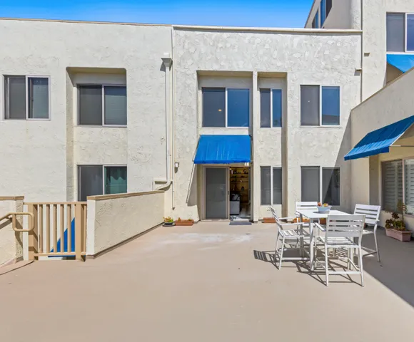 a view of a building with sitting area