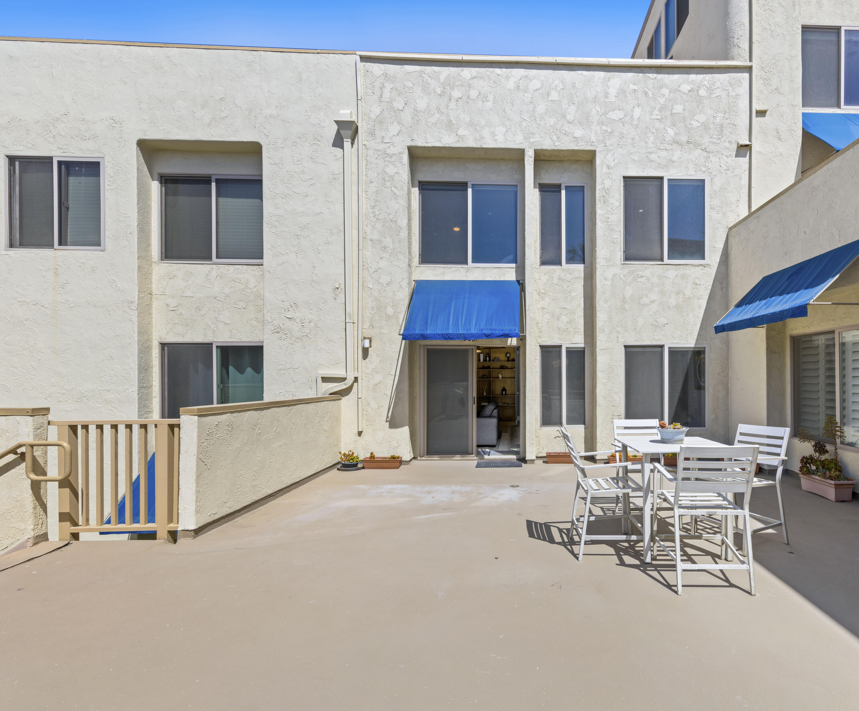 711 Pacific Coast Highway, Unit 206 Huntington Beach, CA 92648 - Photo 23 of 32 a view of a building with sitting area