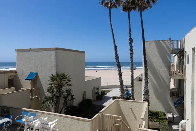a view of balcony with furniture