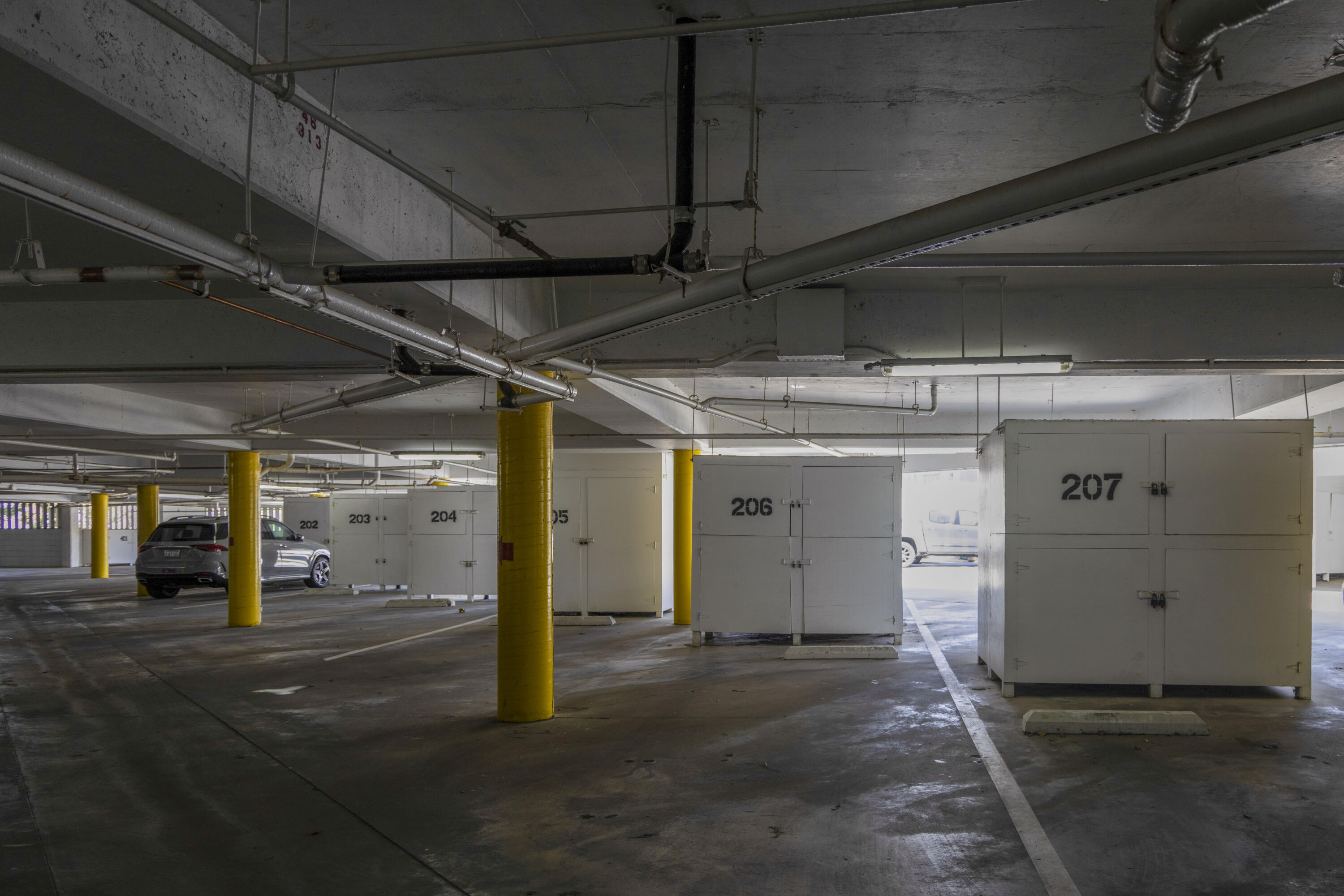711 Pacific Coast Highway, Unit 206 Huntington Beach, CA 92648 - Photo 28 of 32 a view of a garage