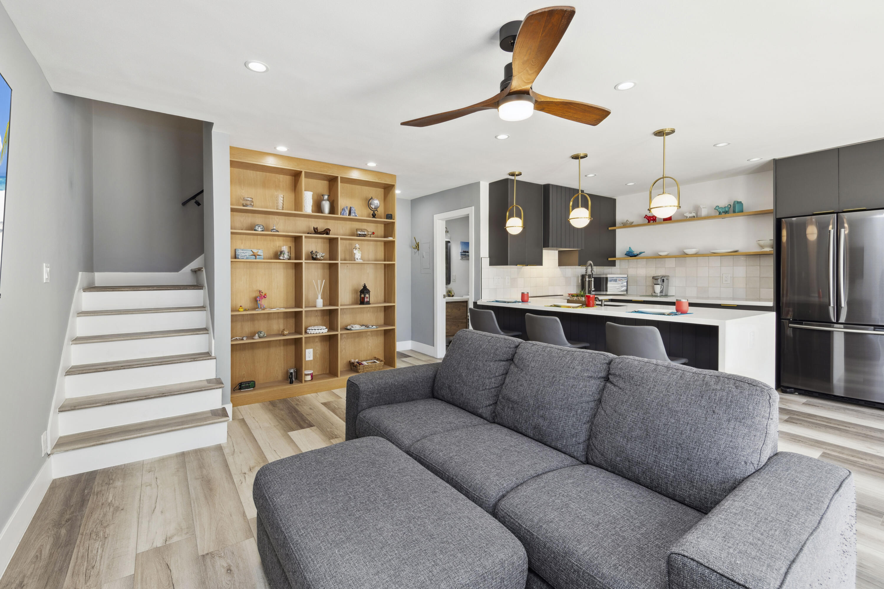 711 Pacific Coast Highway, Unit 206 Huntington Beach, CA 92648 - Photo 7 of 32 a living room with furniture and kitchen view