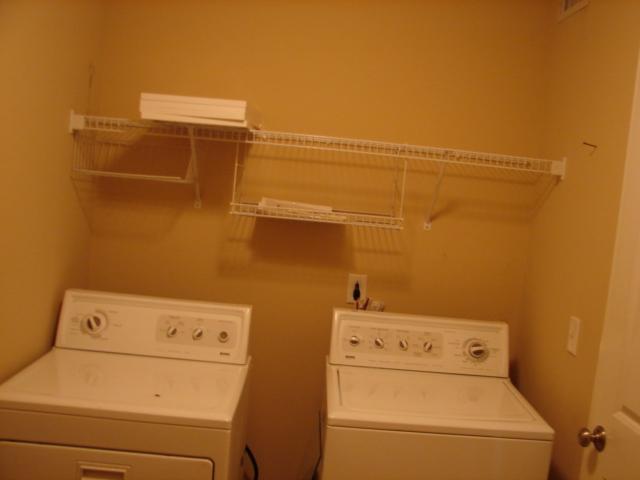 1400 Ripken Court Murfreesboro, TN 37129 - Photo 14 of 20 This is the picture of the Large Laundry/Utility room. There is room in here for a folding counter to be added and to have the ironing board up as well!!