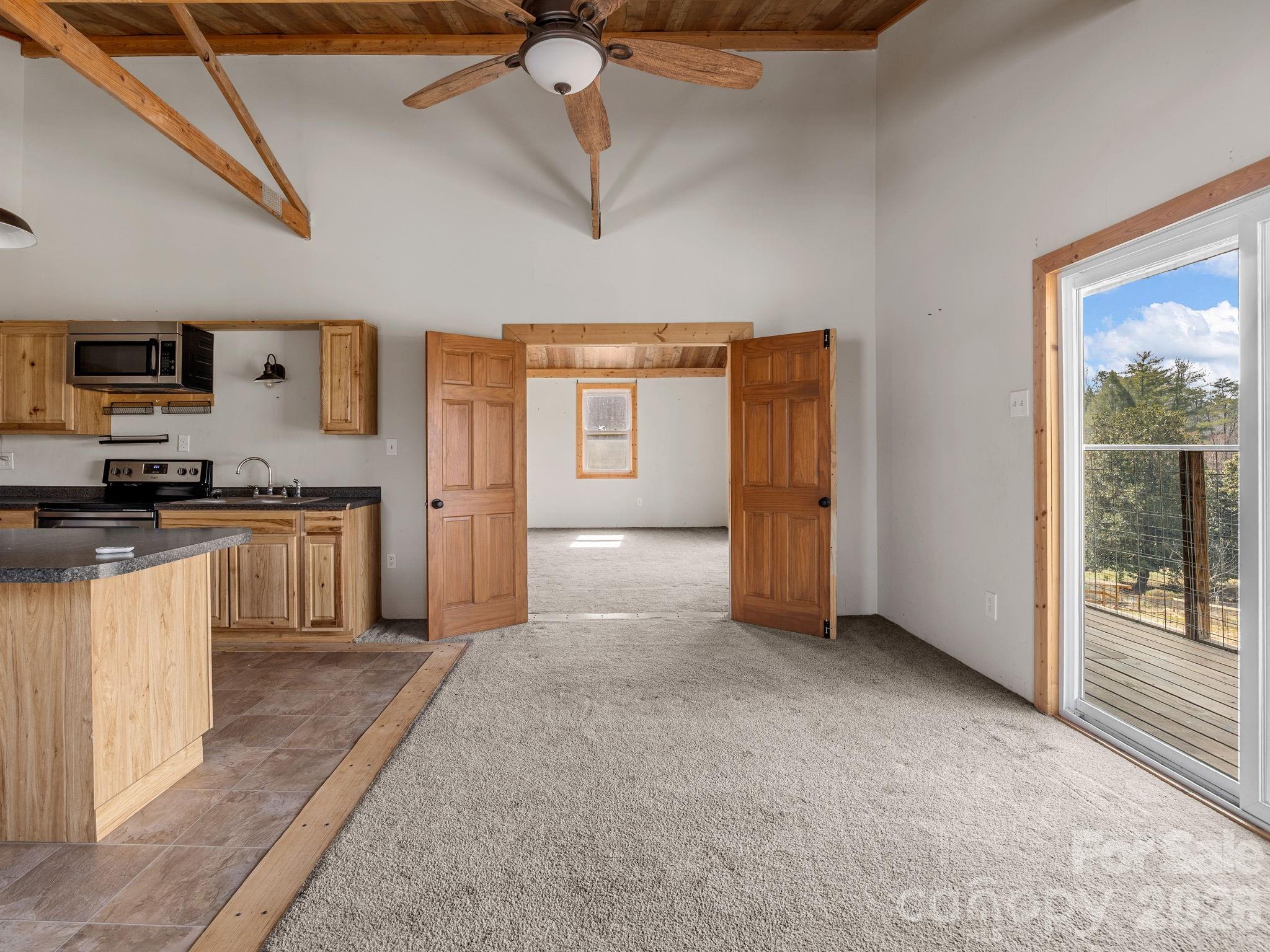 1487 Hayes Road Columbus, NC 28722 - Photo 12 of 48 a big room with closet and windows