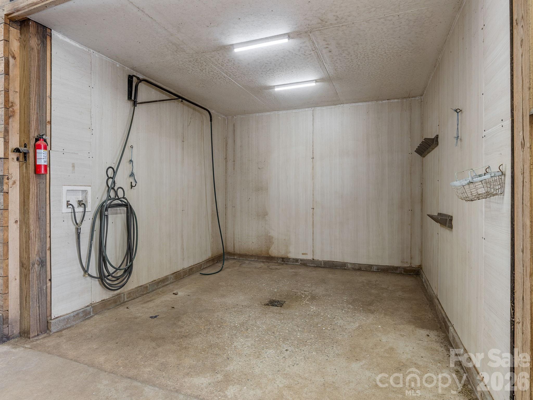 1487 Hayes Road Columbus, NC 28722 - Photo 25 of 48 a view of a storage & utility room with washer and dryer