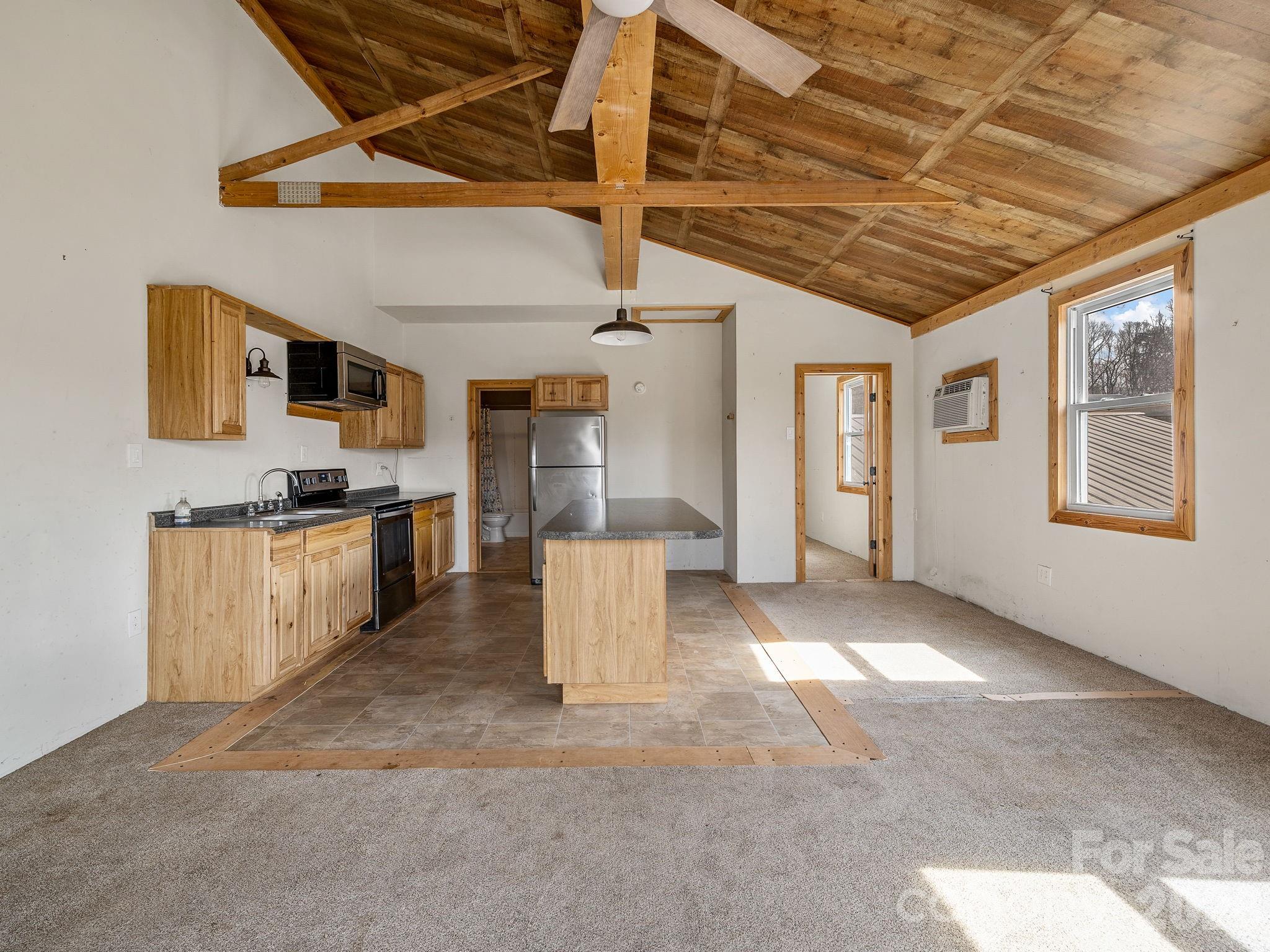 1487 Hayes Road Columbus, NC 28722 - Photo 3 of 48 a view of kitchen with stainless steel appliances granite countertop lots of counter top space