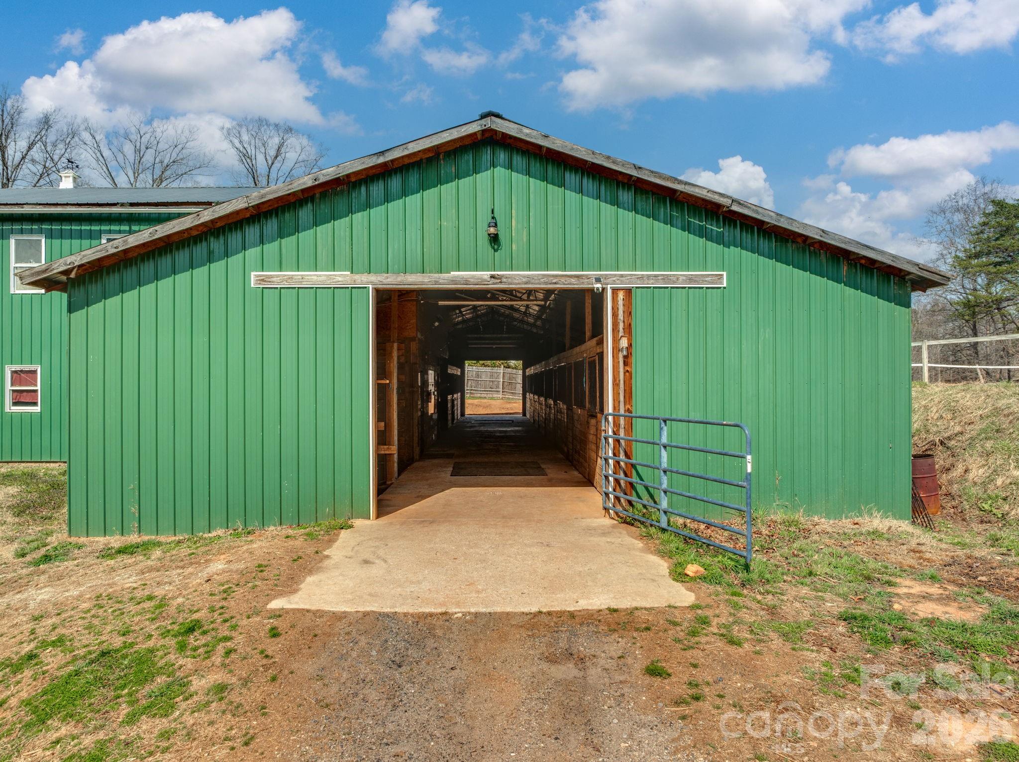1487 Hayes Road Columbus, NC 28722 - Photo 31 of 48 a front view of a house with garage