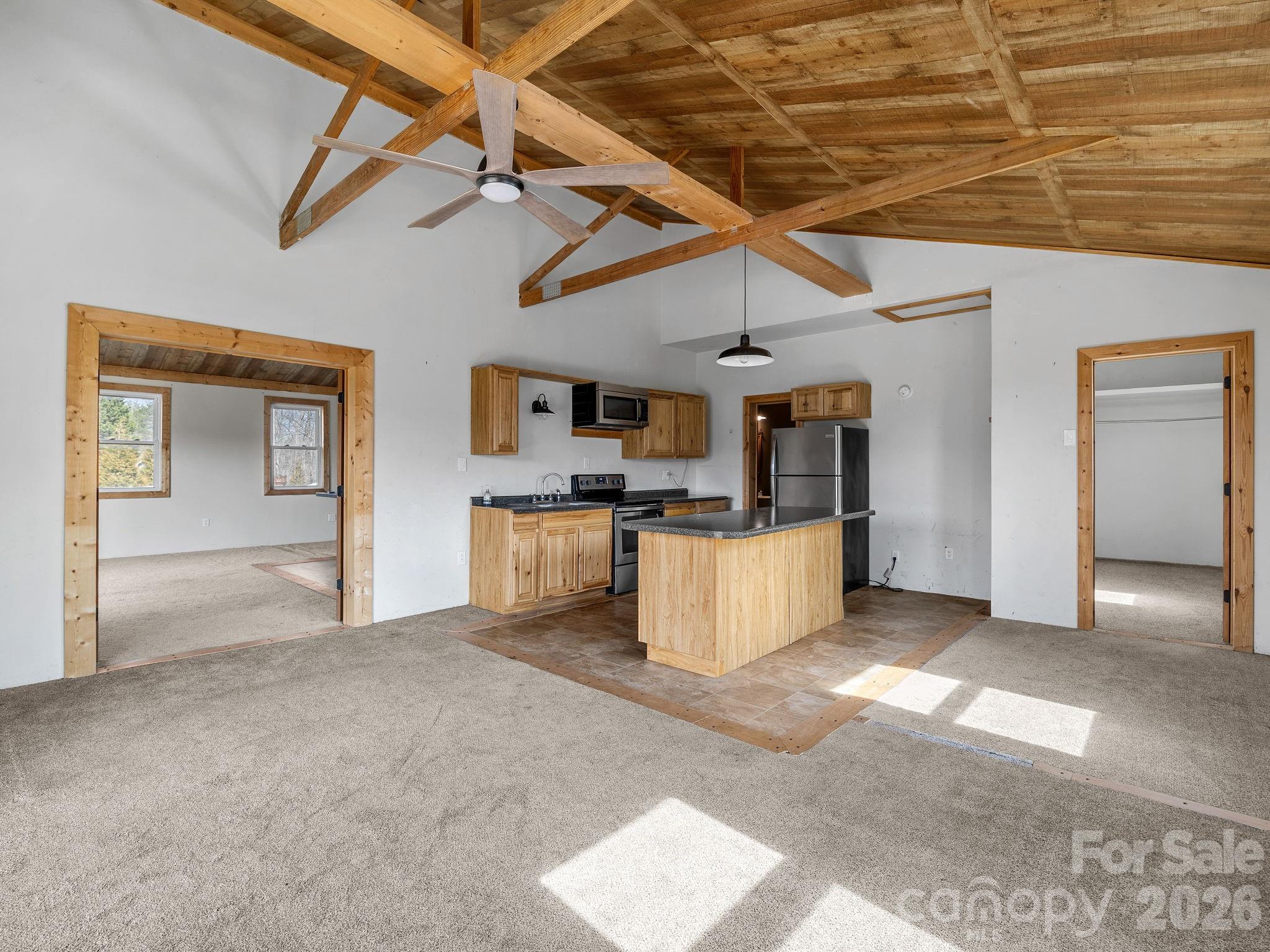 1487 Hayes Road Columbus, NC 28722 - Photo 4 of 48 a view of a kitchen with microwave and cabinets