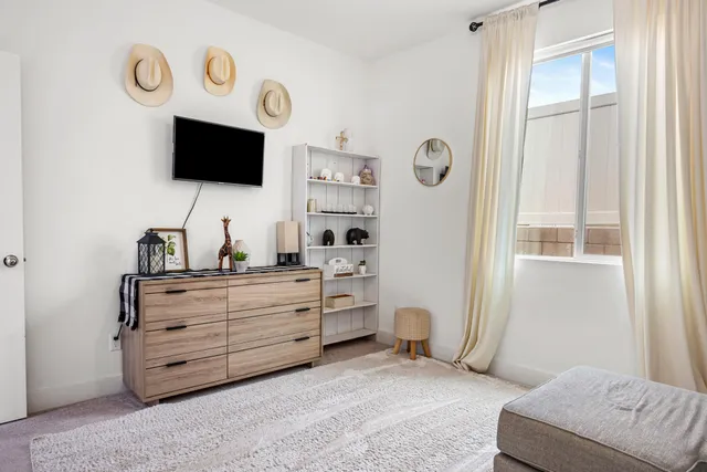 a living room with large windows