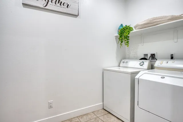 a view of a swimming pool with sitting area