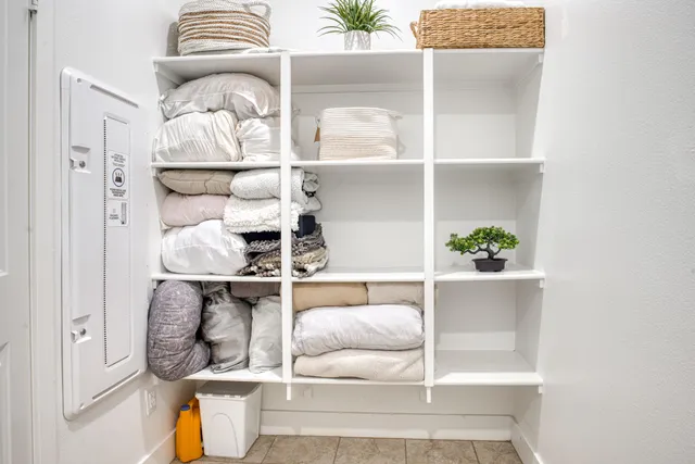 a view of a field of grass and trees