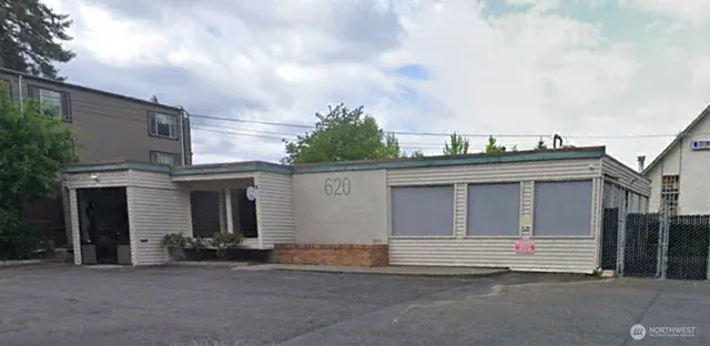 a house view with a garden space
