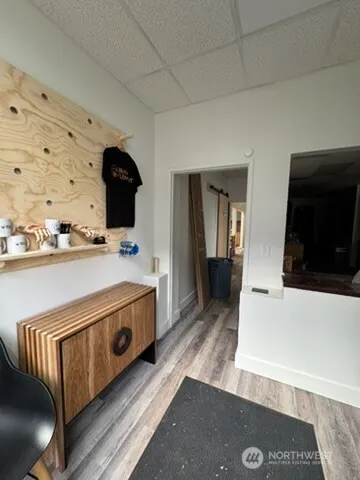 a view of living room with furniture and flat screen tv