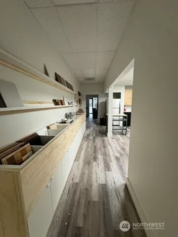 a view of living room with wooden floor