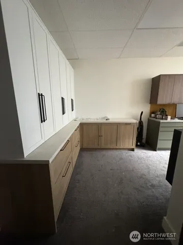 a view of hallway with washer and dryer