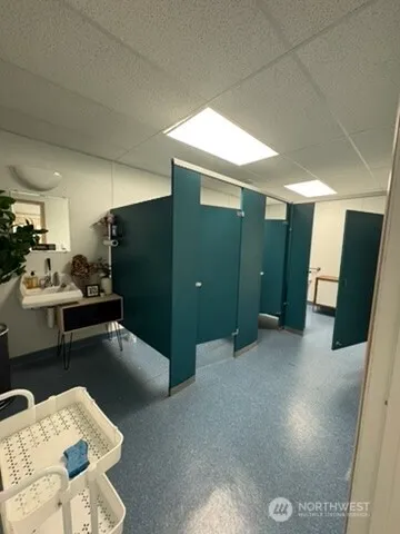 a view of a livingroom with furniture and window