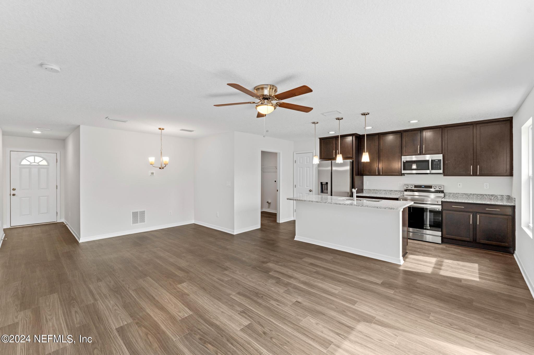 6211 Moncrief Road West Jacksonville, FL 32219 - Photo 14 of 26 Living/Kitchen Aera