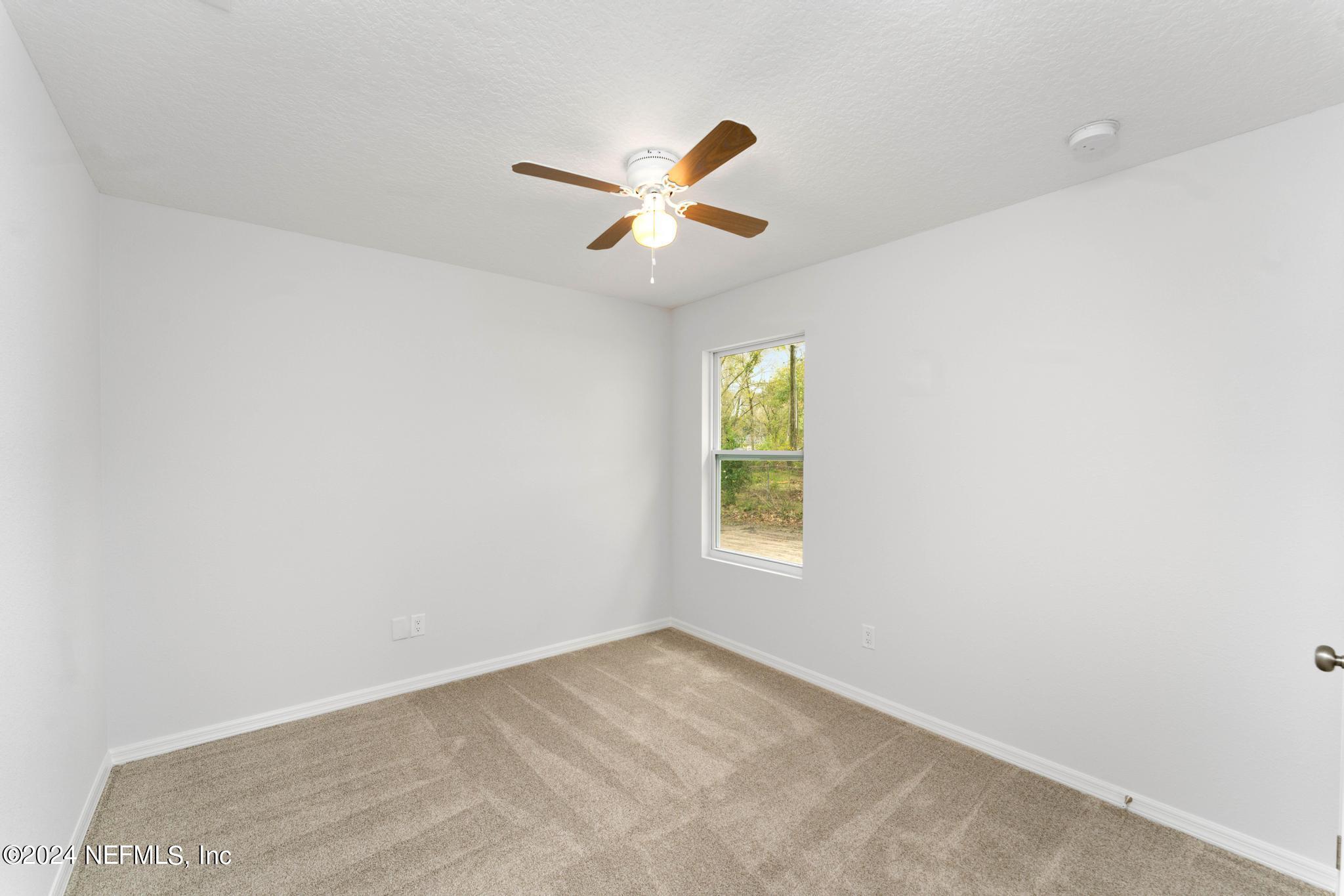 6211 Moncrief Road West Jacksonville, FL 32219 - Photo 21 of 26 Third Bedroom