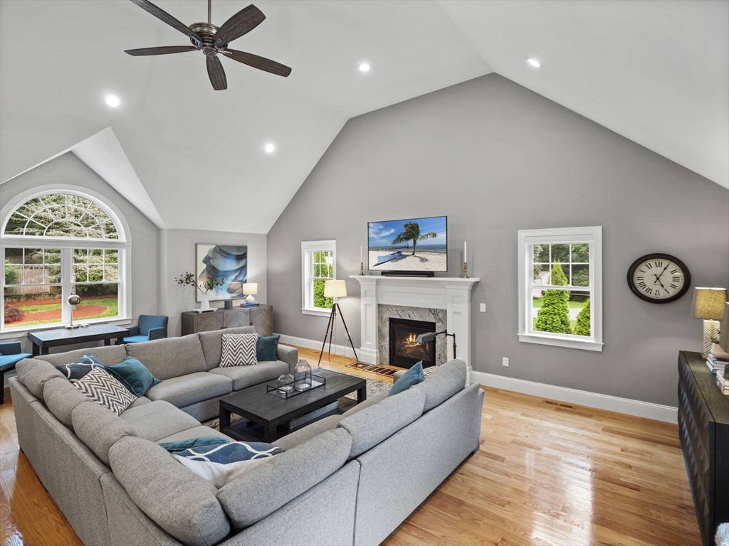 3 Mooney Road Burlington, MA 01803 - Photo 13 of 34 a living room with furniture a window and a fireplace