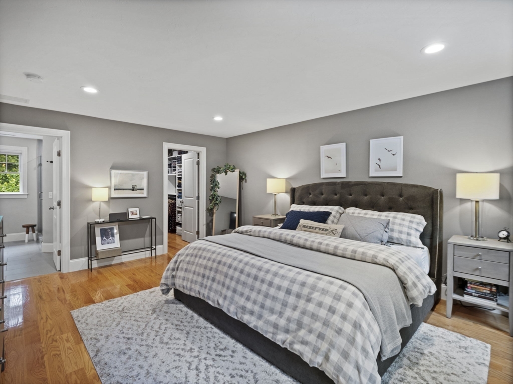 3 Mooney Road Burlington, MA 01803 - Photo 23 of 34 a bedroom with a large bed a couch and dresser