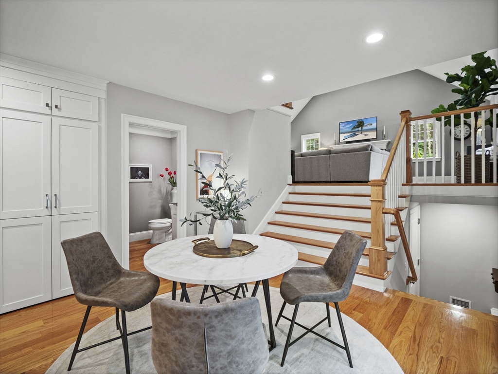 3 Mooney Road Burlington, MA 01803 - Photo 10 of 34 a dining room with furniture and wooden floor