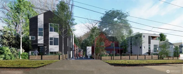 a view of a brick building next to a yard