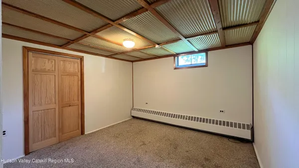 a view of a room with an empty space