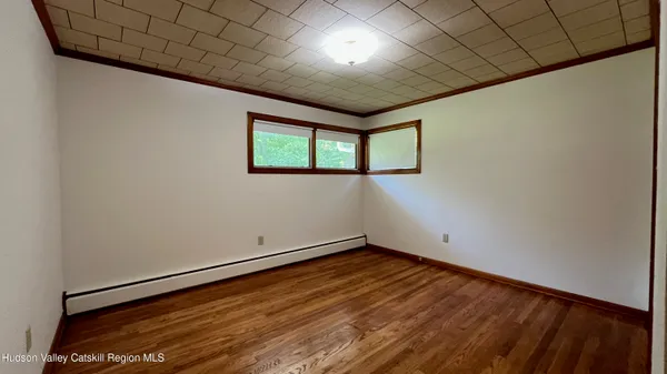 a view of empty room with windows