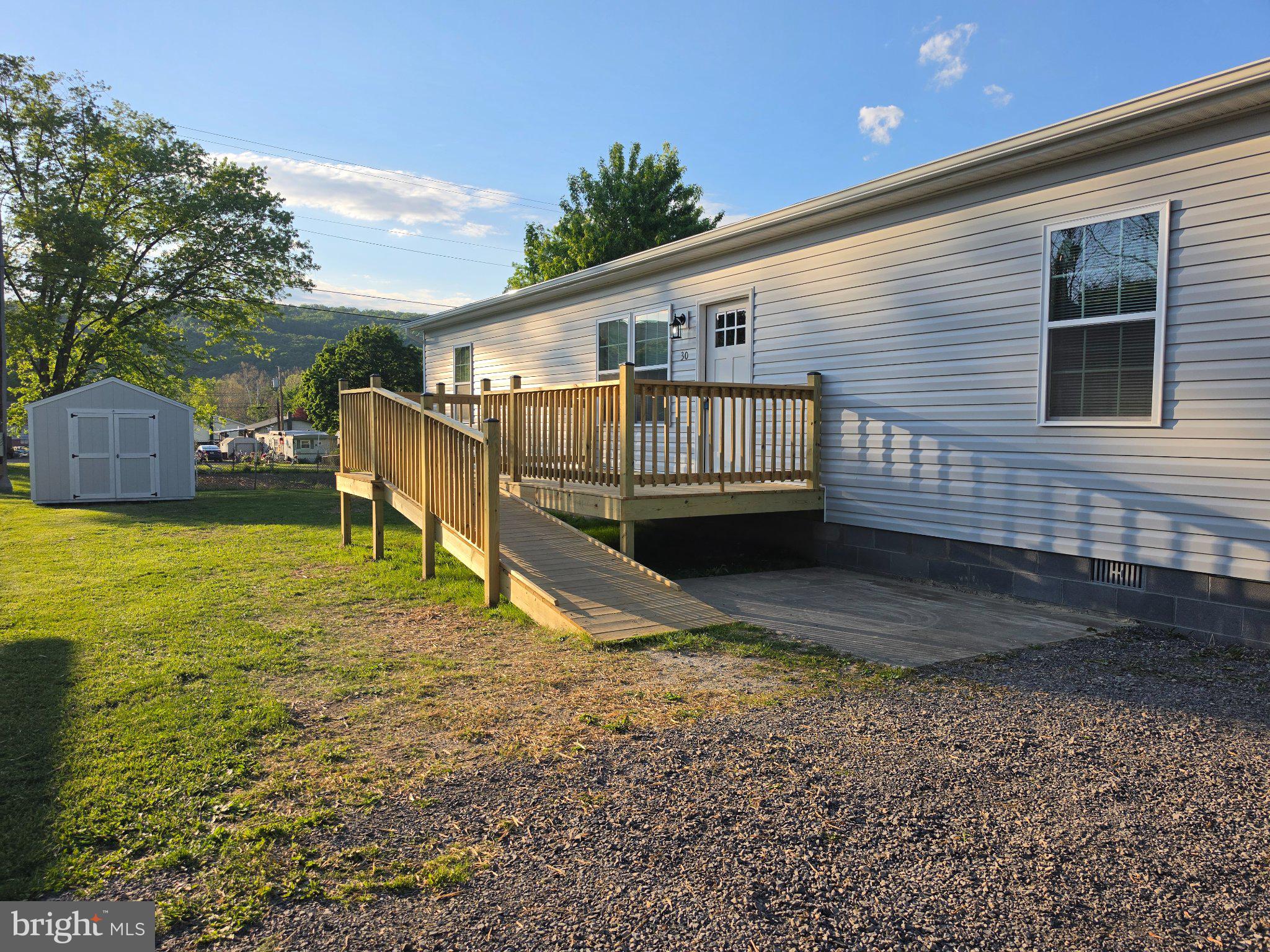 30 South Skyline Drive Ridgeley, WV 26753 - Photo 7 of 15 a view of a house with backyard and sitting area