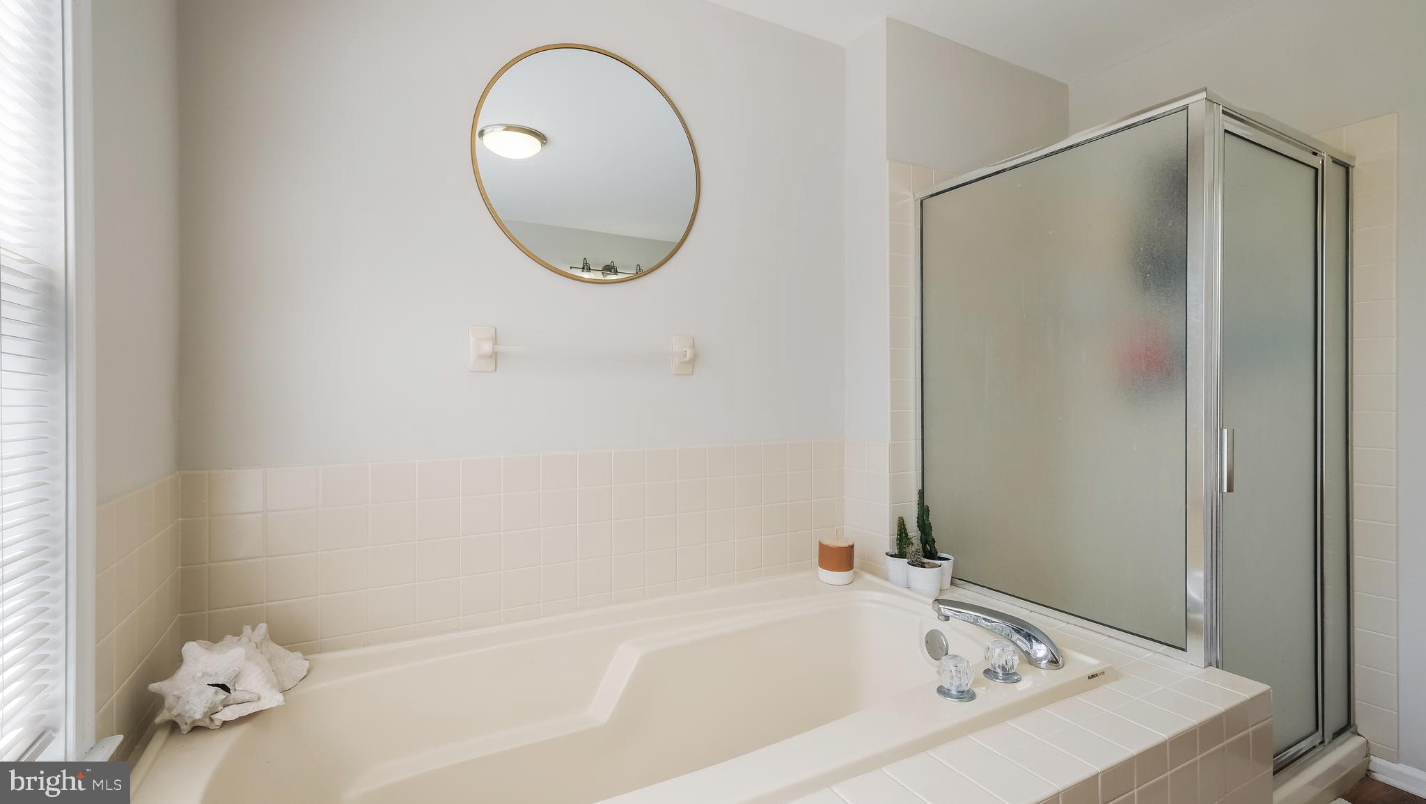 78 Charing Cross Road, Unit 46 Doylestown, PA 18901 - Photo 21 of 33 soaking tub and stall shower in owner's suite area