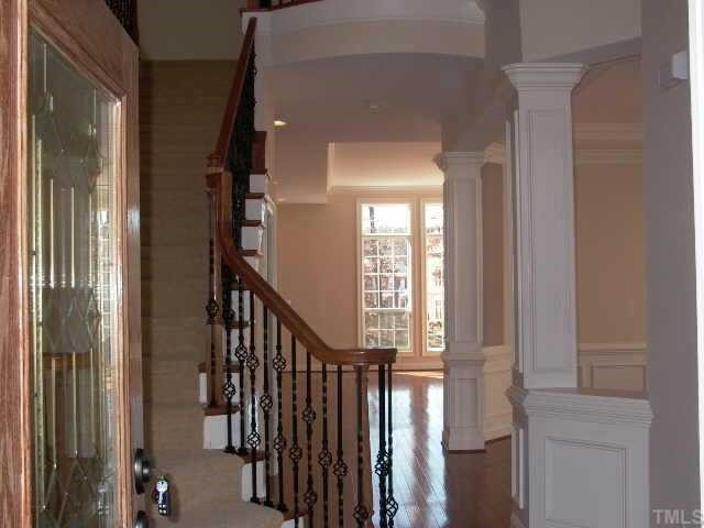 2204 Clayette Court Raleigh, NC 27612 - Photo 10 of 10 Welcoming entry! Large formal sitting room or study on the right. Ten foot ceilings & well crafted mouldings thru out the 1st floor. Hardwood flooring in foyer, study, dining rm, & family room. Other