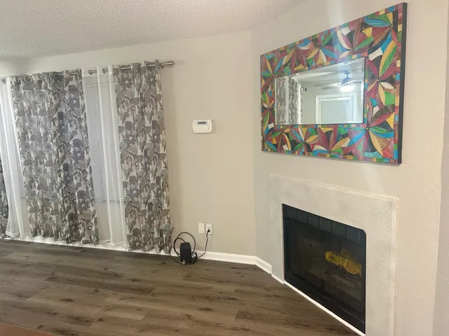 a view of a storage and utility room with a washer dryer