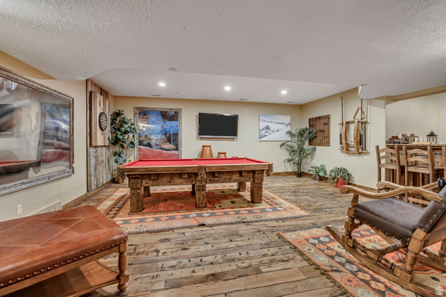 9049 Timphaven Road Sundance, UT 84604 - Photo 44 of 63 Rec room featuring pool table, hardwood / wood-style floors, a textured ceiling, and recessed lighting