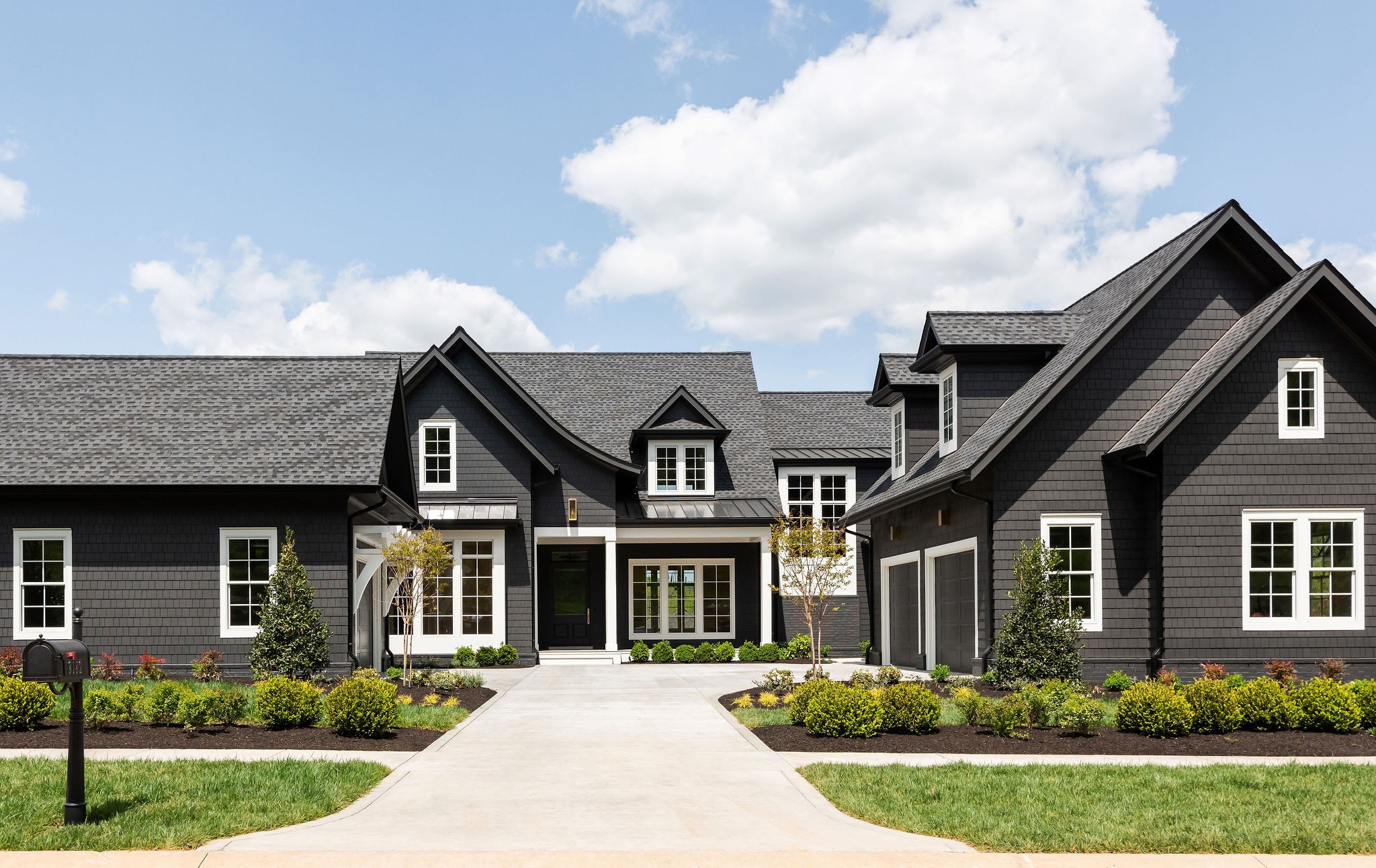 front view of a house with a yard