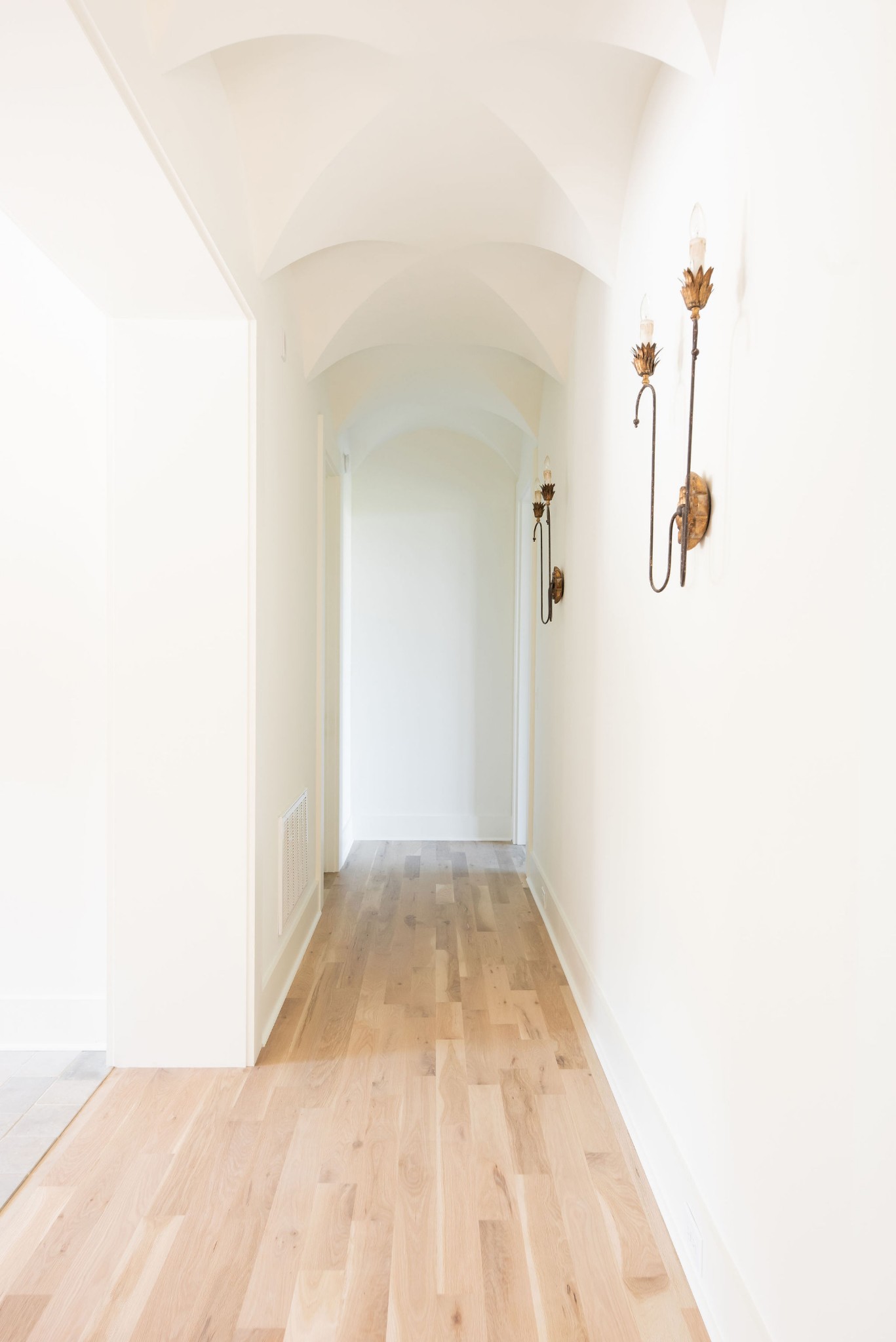 8182 Heirloom Boulevard College Grove, TN 37046 - Photo 22 of 34 a view of a hallway with wooden floor