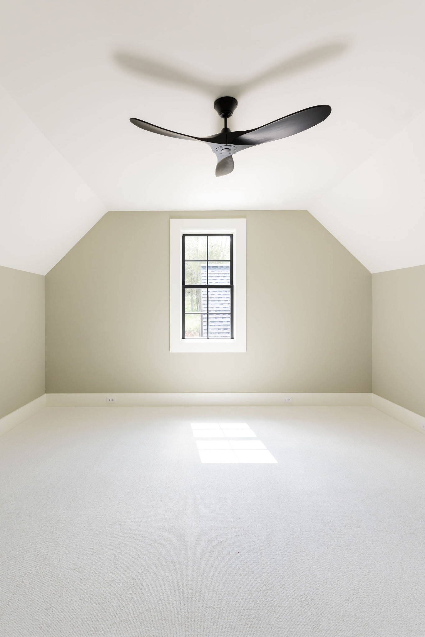 8182 Heirloom Boulevard College Grove, TN 37046 - Photo 29 of 34 an empty room with windows and fan